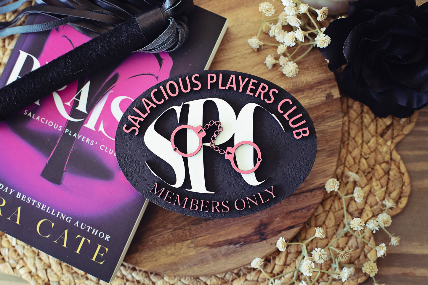 Salacious Players Club Sign