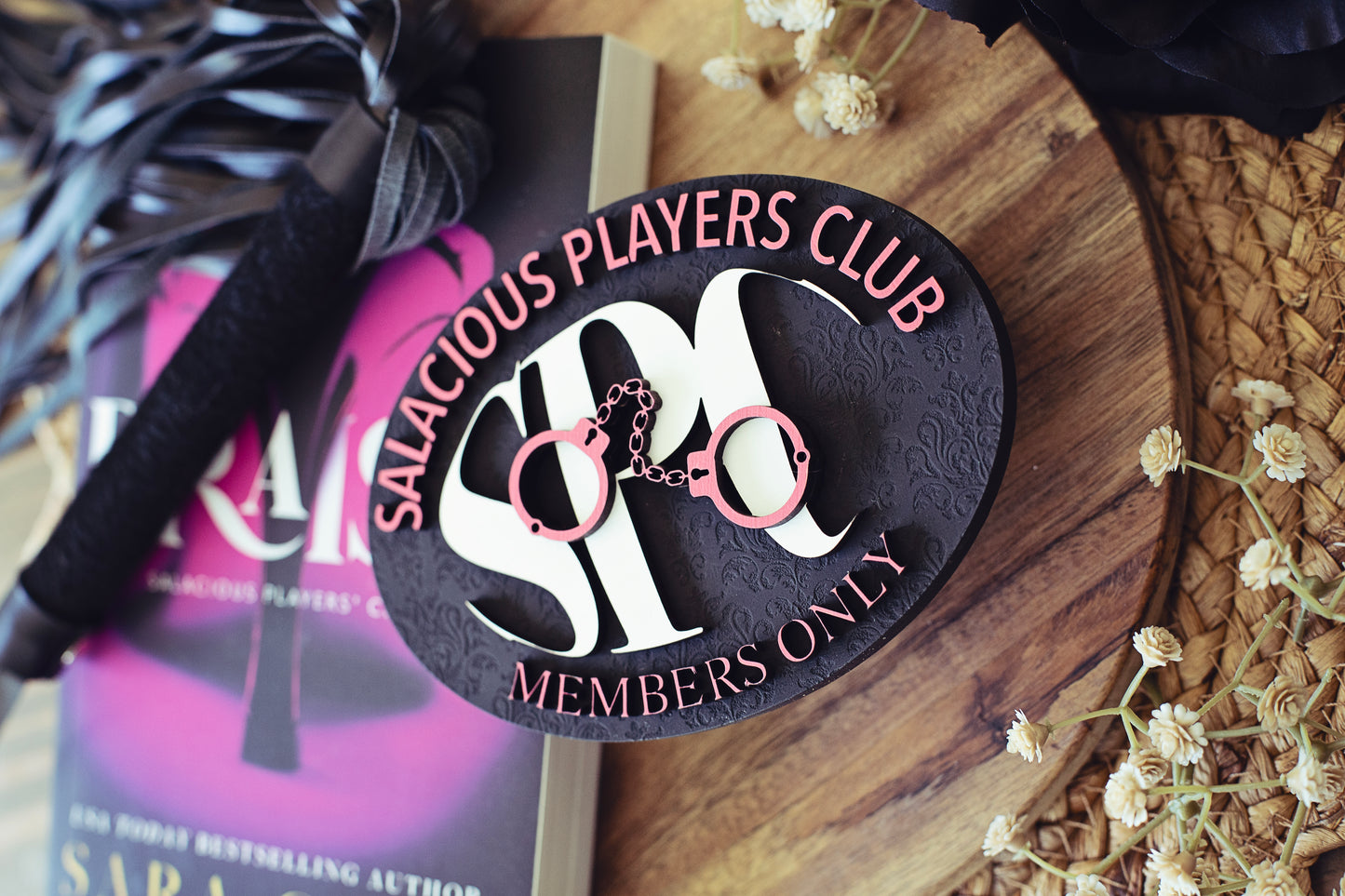 Salacious Players Club Sign