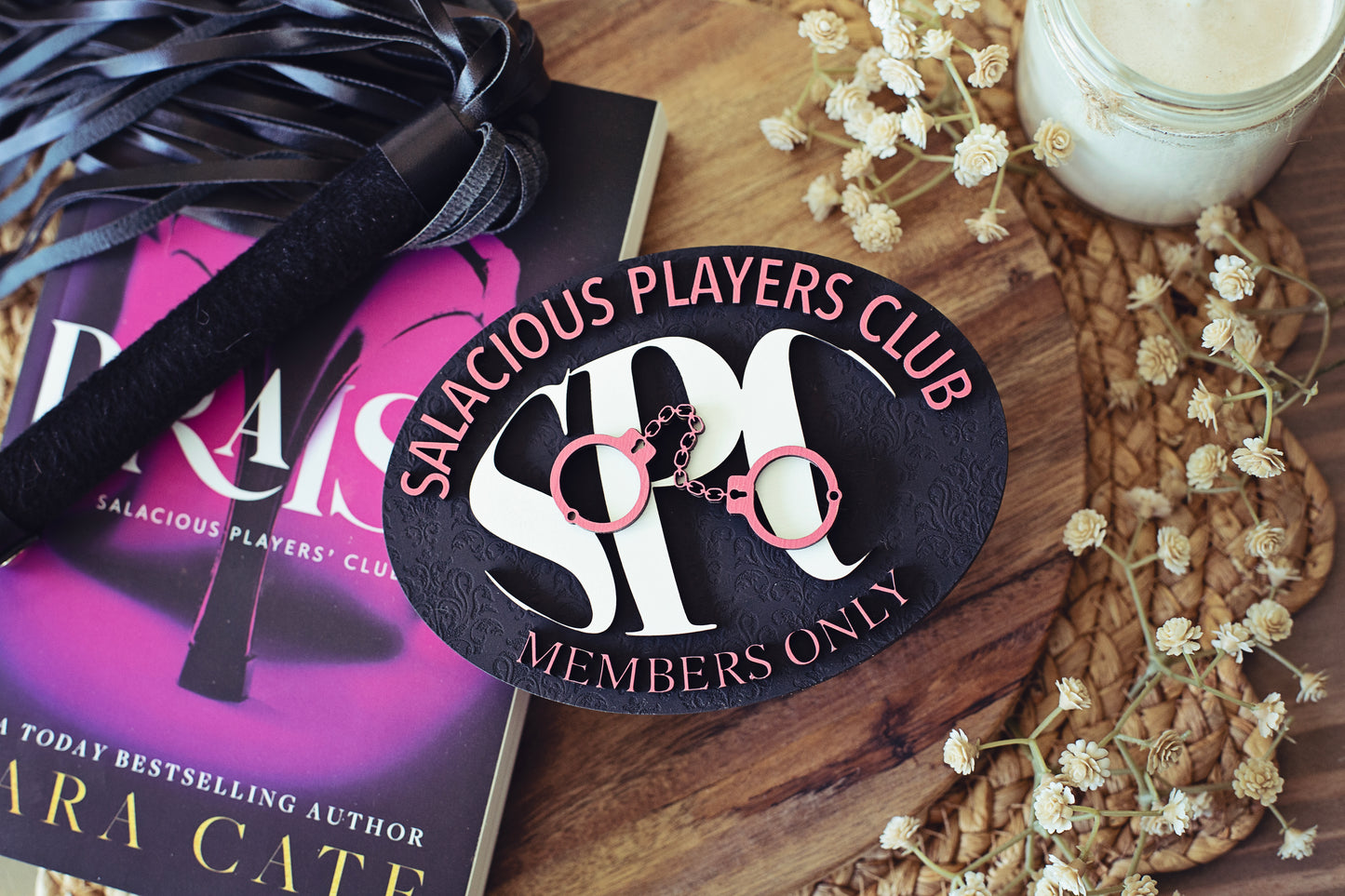 Salacious Players Club Sign