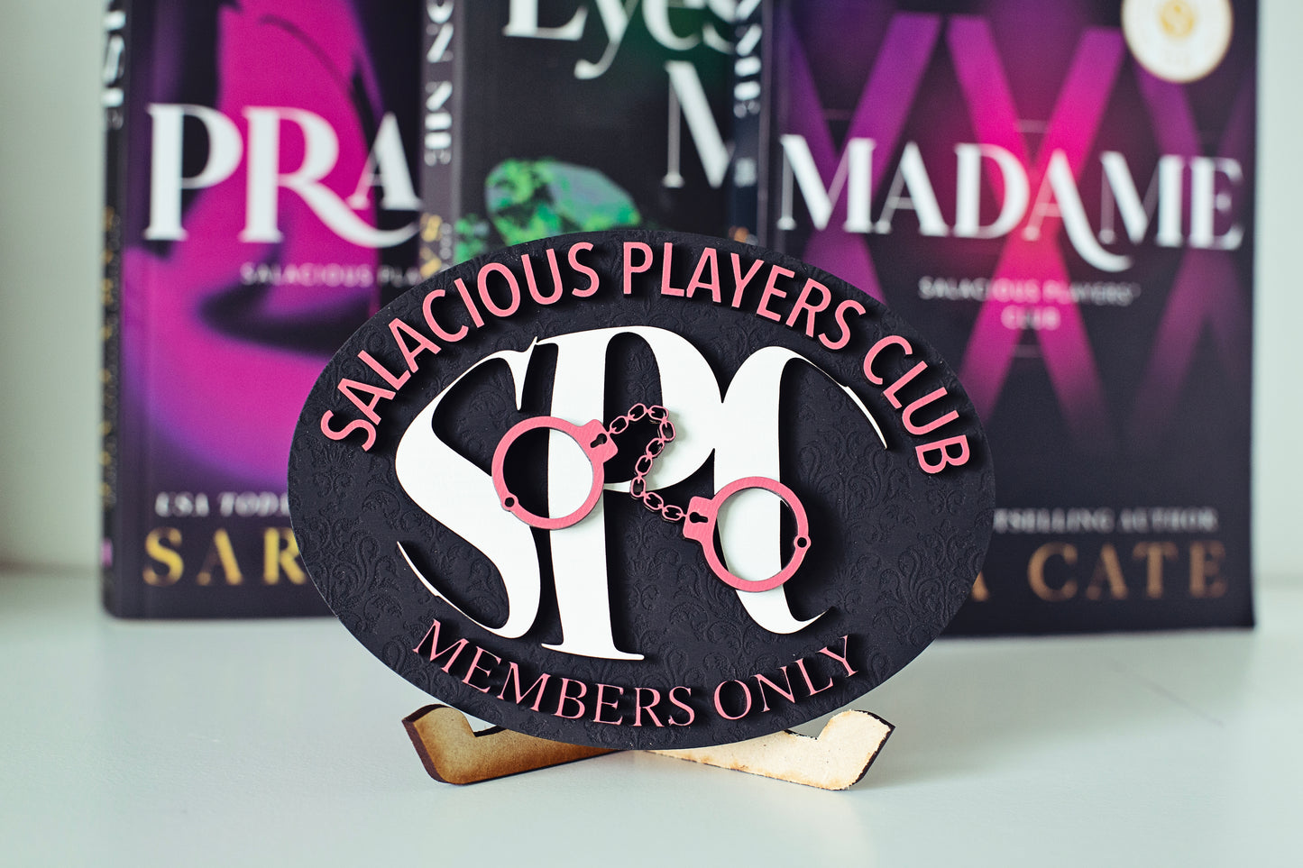 Salacious Players Club Sign