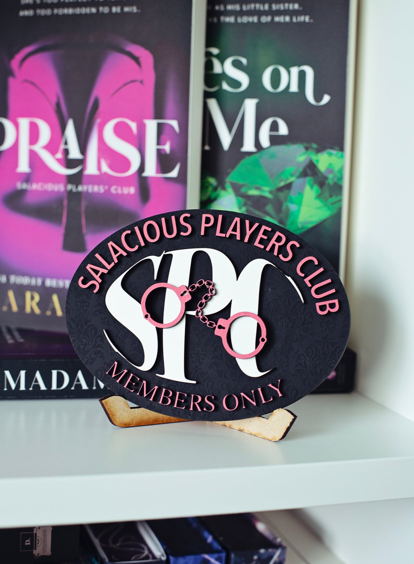 Salacious Players Club Sign